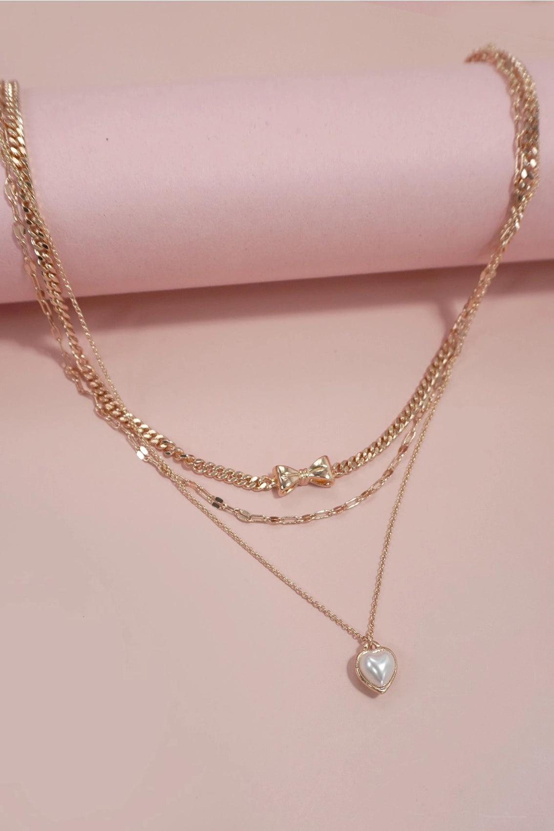 Pearl heart and bow necklace