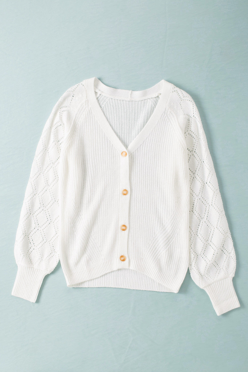 The Veda Button Sweater